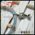light blue cotton cord with silver fish adjustable cord bracelet